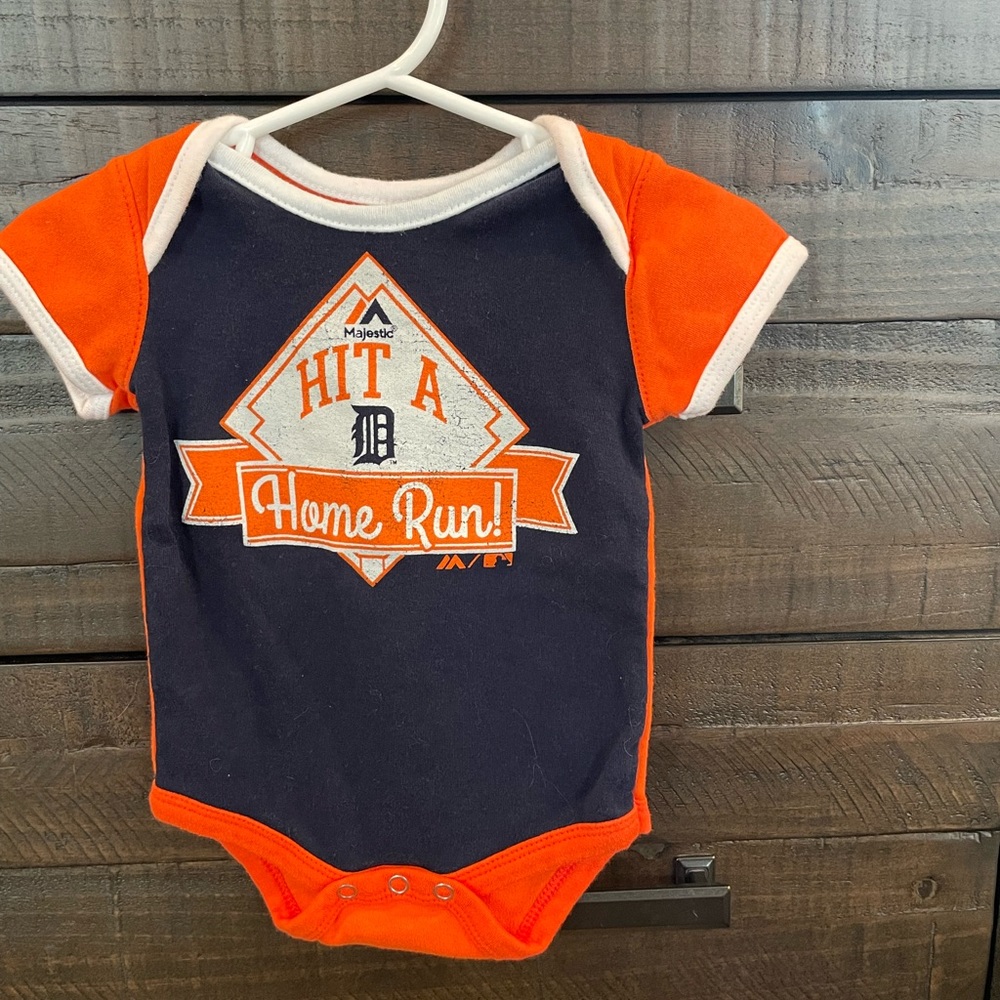 Never worn Detroit onesie.